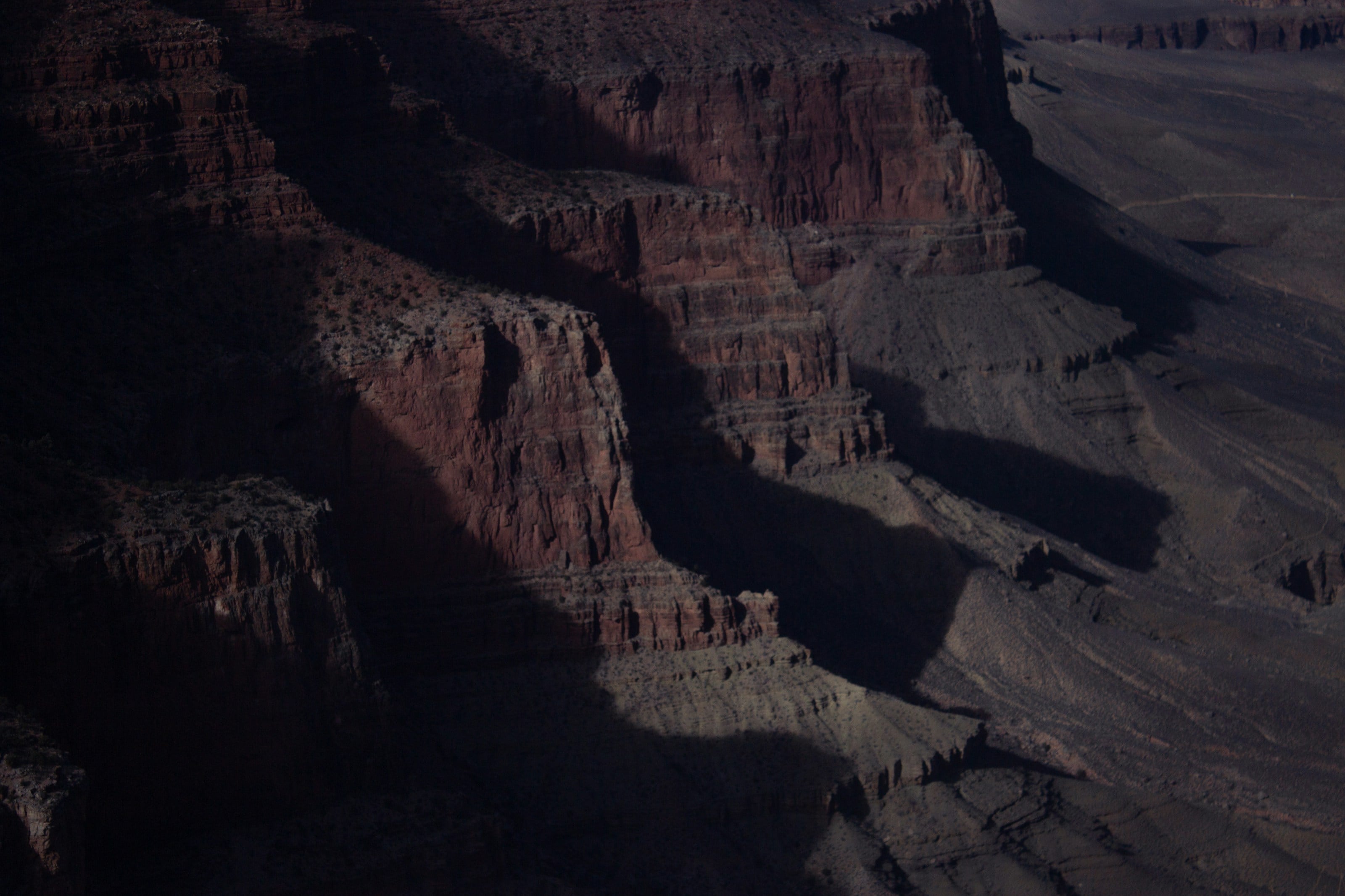 The grand canyon's layered rock formations are visible.
