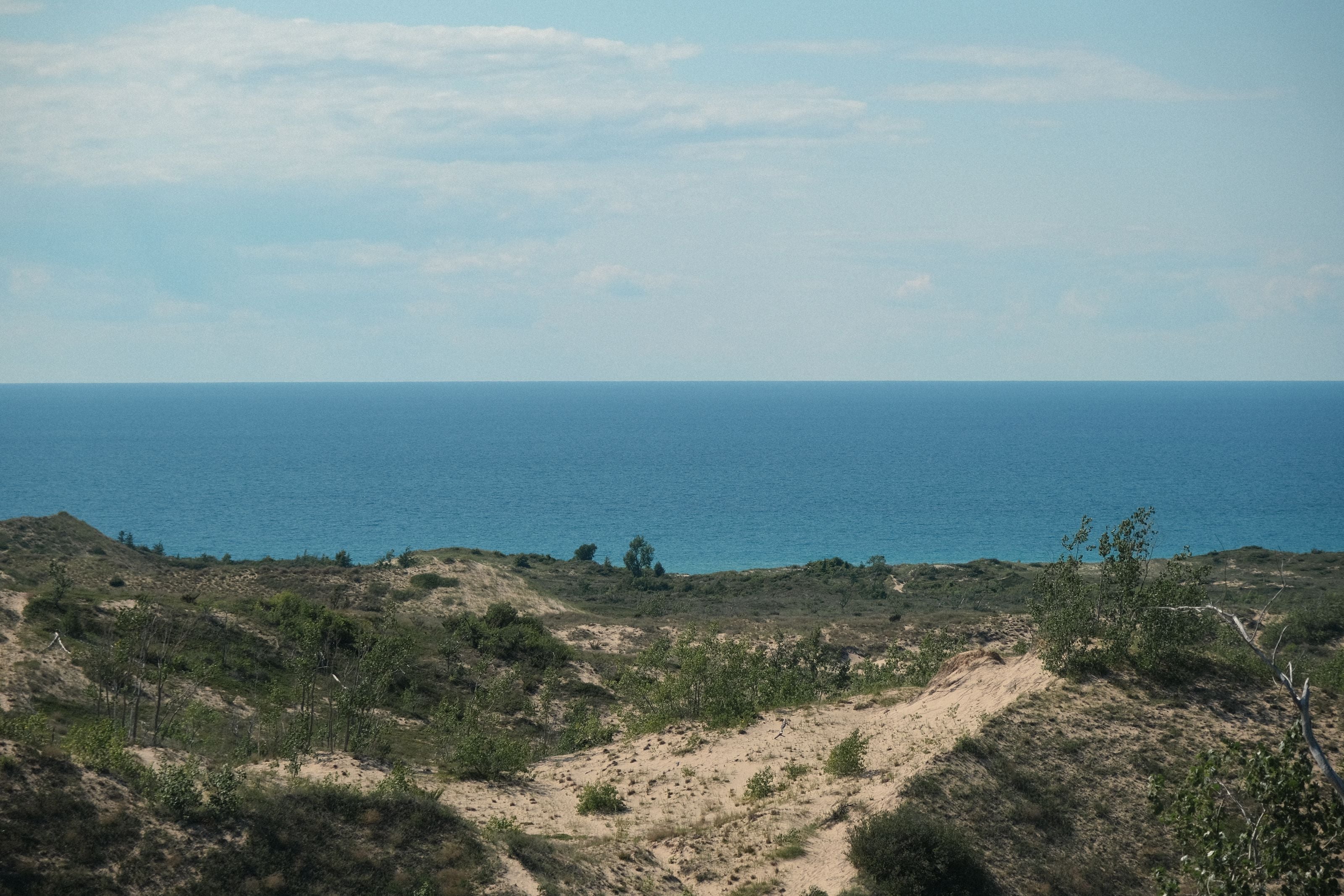 Beautiful landscape of dunes and Lake Michigan viewed from Maple City, MI.